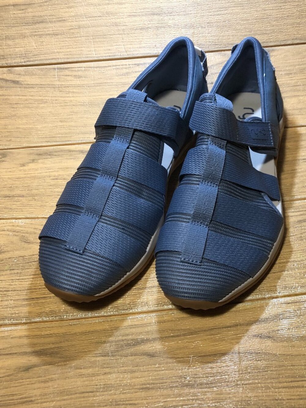 Ryka Echo Women Fisherman Sandal in a blue woven fabric finish. 12